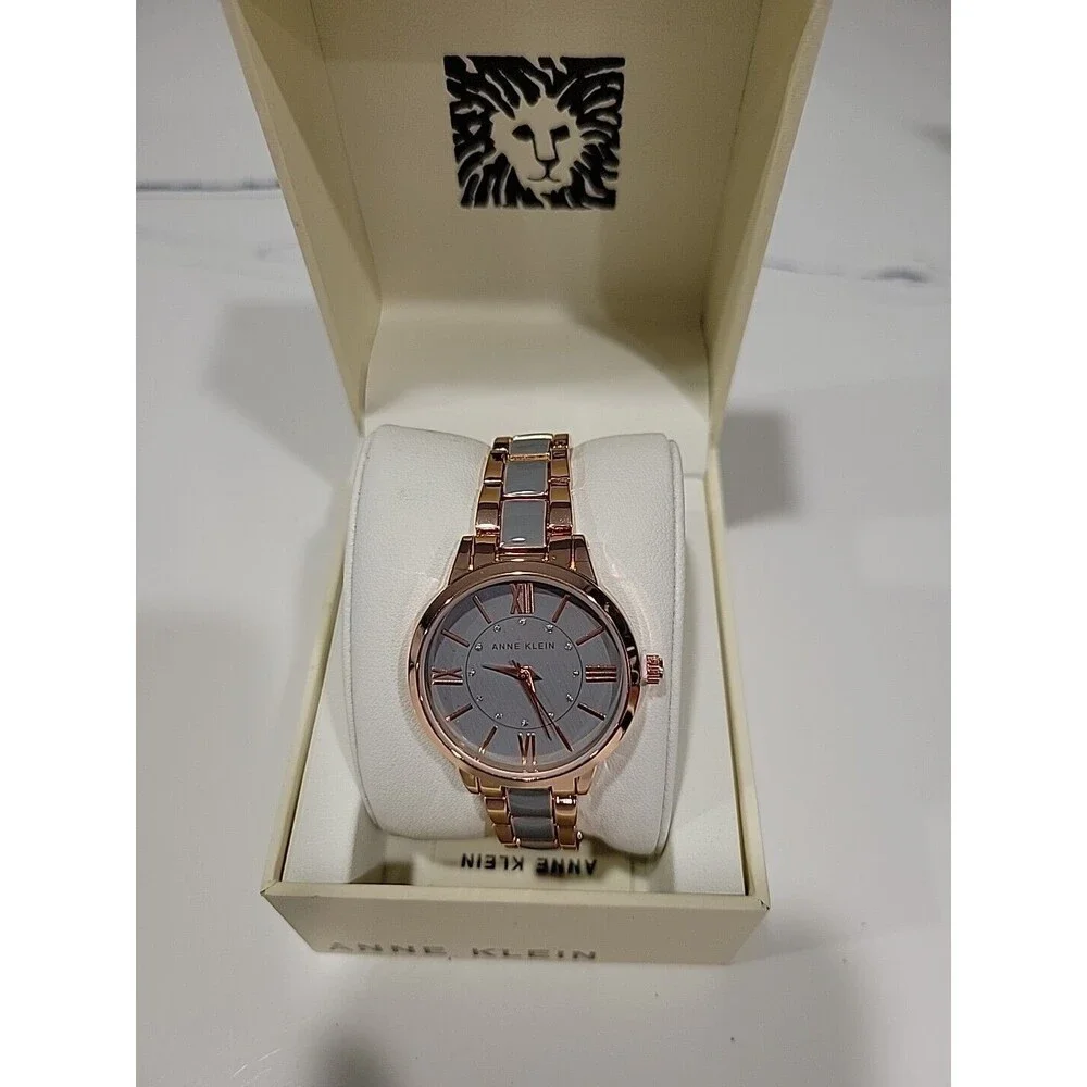 Anne Klein Women's Rose Gold-Tone and Light Pink Resin Bracelet Watch